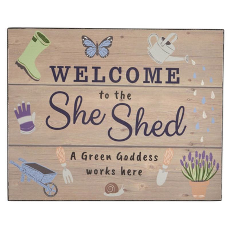 Welcome to the She Shed. A Green Goddess Works Here. Wooden sign by Transomnia. Decorated with watering can wellington boots butterfly and other gardening items. Perfect for a lady who loves gardening. Would make a lovely gift. 